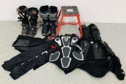 A GROUP OF MOTOR CROSS CLOTHING AND FOOTWEAR, SIZES 9 AND 10.5.