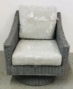 RATTAN WICKER SWIVEL CHAIR WITH GREY CUSHIONS.