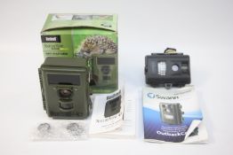 TWO TRAIL CAMERAS TO INCLUDE BUSHNELL HD BOXED WITH INSTRUCTIONS AND SWAN WITH INSTRUCTIONS.