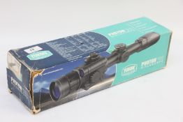 YUKON ADVANCED OPTICS PHOTON 35X42 RIFLE SCOPE WITH BOX AND INSTRUCTIONS (NO MOUNTS).