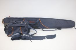 A GROUP OF BERETTA SHOOTING ACCESSORIES TO INCLUDE CARTRIDGE BAG,