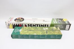 BOXED PORTEK SENTINEL WIND DRIVEN BIRD SCARER AND BOXED BIRD FEEDING STATION.