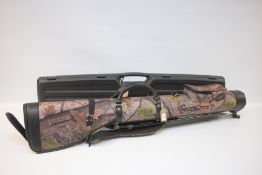 HAMILTON MOSSY OAK SHOTGUN CASE ON STAND + DOSKO HARD TRANSIT CASE.