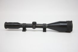 SCHMIDT & BENDER 8 X 56 RIFLE SCOPE WITH MOUNTS.