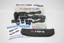 A BOXED ATN X SIGHT 4K PRO 3-14 X SMART HD DAY / NIGHT RIFLE SCOPE WITH ACCESSORIES.