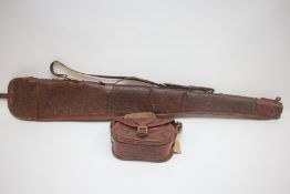 AN EXOTIC SNAKE SKIN SHOTGUN SLEEVE + MATCHING CARTRIDGE BAG.