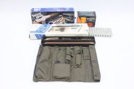 A GROUP OF CLEANING AND GUN MAINTENANCE EQUIPMENT TO INCLUDE RODS AND RELOADER TOOL.