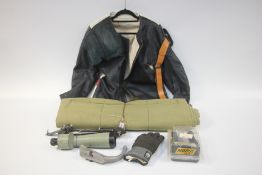 GROUP OF SHOOTING ACCESSORIES TO INCLUDE ANDREW TUCKER JACKET, ROLL MAT, SPOTTING SCOPE GUN RACK,