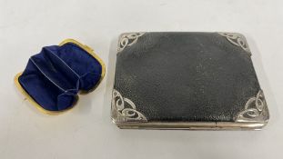 A VINTAGE GILDED COIN PURSE ALONG WITH A VINTAGE LEATHER CASE WITH SILVER NOUVEAU CORNERS.