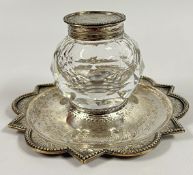 AN ANTIQUE SILVER MOUNTED HEAVY GLASS INKWELL AND STAND, LONDON 1862, MAKER R.