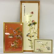 THREE FRAMED ORIENTAL SILK NEEDLE WORK PANELS (THE LARGEST W 36 X H 1 METRE).