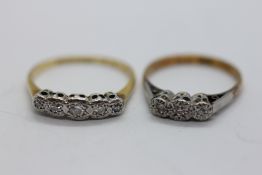 TWO 18CT AND PLATINUM DIAMOND SET RINGS.