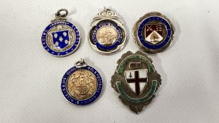 A GROUP OF FIVE FOOTBALL ASSOCIATED SILVER MEDALLIONS INCLUDING CATFORD, READING, NORTH LONDON,