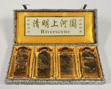 A BOXED SET OF 4 DECORATIVE ORIENTAL GLASS SNUFF / SCENT BOTTLES.