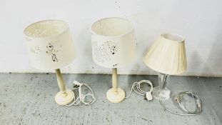 A PAIR OF CREAM BEDSIDE TABLE LAMPS PLUS A FURTHER EXAMPLE - SOLD AS SEEN.