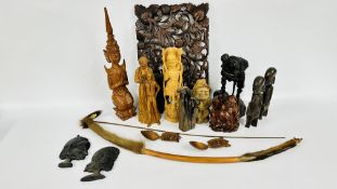 A GROUP OF ETHNIC WOODEN CARVED SCULPTURES AND BUSTS ALONG WITH AN OPEN WORK CARVED PANEL AND A