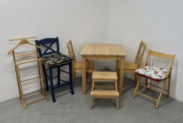 A MODERN LIGHT BEECH BREAKFAST TABLE AND TWO BEECH WOOD DINING CHAIRS (TOP MARKED),