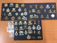 MILITARIA: A COLLECTION OF CAP BADGES MOUNTED ON THREE CARDS, MIX OF ORIGINAL, RESTRIKES,
