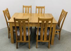 A MODERN SOLID LIGHT OAK EXTENDING DINING TABLE AND SIX SOLID LIGHT OAK DINING CHAIRS (CLOSED L 143