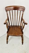 VINTAGE PINE FRAMED STICK BACK ELBOW CHAIR.