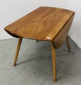 AN ERCOL BLONDE STYLE DROP LEAF TABLE, W 113, H 73CM.