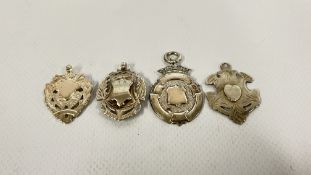 A GROUP OF FOUR BLANK SILVER MEDALLIONS, VARYING DESIGNS.