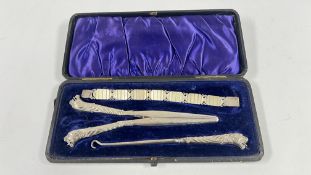 AN INCOMPLETE ANTIQUE VANITY SET WITH ELABORATE SILVER (FILLED) MOUNTS DEPICTING TIGER / PANTHER