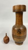 A RE-PURPOSED VINTAGE RUSTIC WOODEN VASE BEARING IMPRESSED MONOGRAM CK H 25CM + A SMALL TREEN
