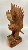 A HAND CARVED WOODEN EAGLE SCULPTURE, H 39.5CM.