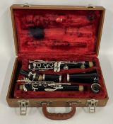 VINTAGE ROOSEY & HAWKENS CLARINET IN ASSOCIATED CASE.