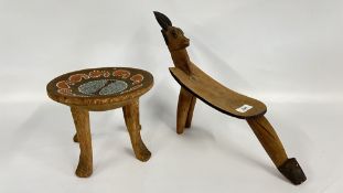 TWO AFRICAN CARVED AND INLAID STOOLS.