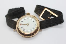 A VINTAGE 9CT GOLD CASED WATCH FACE, ENAMEL DIAL A/F,