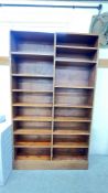 AN EIGHT TIER FULL HEIGHT BOOKSHELF WITH ADJUSTABLE SHELVING.