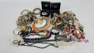 A BOX OF ASSORTED COSTUME JEWELLERY TO INCLUDE BEADED NECKLACES, BANGLES, EARRINGS AND BROOCHES ETC.