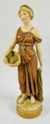 ROYAL DUX FIGURE 2123 DEPICTING A LADY CARRYING A FISH BASKET, SMALL CHIP TO RIM, HEIGHT 37.5CM.