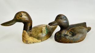 A VINTAGE CAST BOOT SCRAPE IN THE FORM OF A DUCK + A VINTAGE PANTED WOODEN DUCK DECOY.
