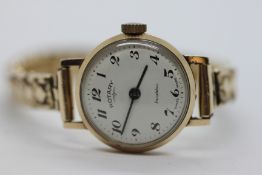 A VINTAGE 9CT GOLD CASED 