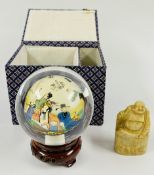 AN ORIENTAL REVERSE DECORATED GLASS BALL / GLOBE ON A CARVED STAND IN A FITTED PRESENTATION BOX + A