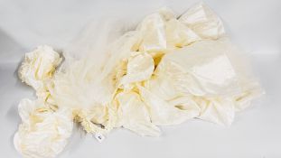 A VINTAGE DESIGNER WEDDING GOWN BEARING ORIGINAL LABEL 