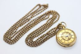A LADY'S 18CT GOLD FOB WATCH, THE DIAL ENGRAVED WITH FLORAL DESIGN AND MARKED WITH ROMAN NUMERALS,