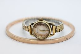 A 9CT ROSE GOLD PLATED BANGLE ALONG WITH A BELINDA AUTOMATIC LADY'S BRACELET WATCH WITH 25 JEWEL