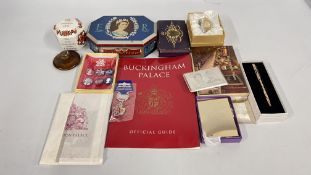 A GROUP OF COMMEMORATIVE SOUVENIRS FROM BUCKINGHAM PALACE TO INCLUDE BADGES, PEN, WATCH, TIN,