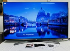LG 55 INCH SMART TELEVISION COMPLETE WITH REMOTE AND INSTRUCTIONS - SOLD AS SEEN.