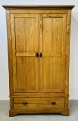 A MODERN SOLID LIGHT OAK DOUBLE WARDROBE WITH DRAWER TO BASE, W 114CM, D 59CM, H 195CM.