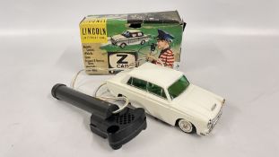 A VINTAGE 1960'S REMOTE CONTROL LINCOLN INTERNATIONAL Z CAR CUT NO.