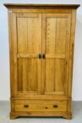 A MODERN SOLID LIGHT OAK DOUBLE WARDROBE WITH DRAWER TO BASE, W 114CM, D 59CM, H 195CM.