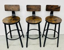 THREE DESIGNER METAL CRAFT BAR STOOLS.