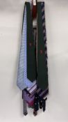 TIE RACK CONTAINING GOOD SELECTION OF QUALITY GENT'S TIES.