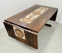 A DANISH MID CENTURY RECTANGULAR DINING TABLE WITH DROP FLAP EXTENSION LEAVES AND INSET TILE PANELS.