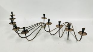 A PAIR OF SCANDINAVIAN STYLE FIVE BRANCH CANDELABRAS.
